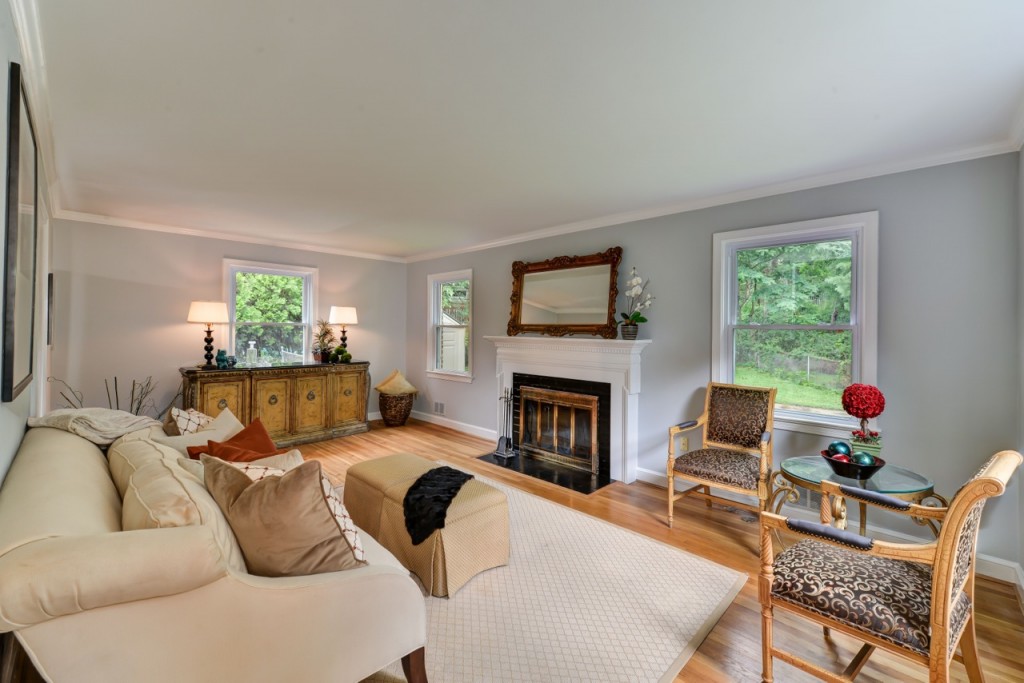 Large living room with wood-burning fireplace